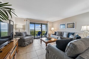 Living area - EMBRACE NATURAL BEAUTY with elegant refinement. Exquisite decor emulates a tropical paradise. (St. George Island)