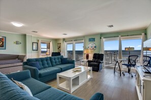 Flat-screen TV, DVD player - LET YOUR CARES DRIFT AWAY as you watch the dolphins play from the newly expanded beachfront deck. (St. George Island)