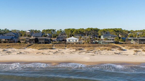 On the beach - LISTEN TO THE SONG of the surf from this adorable island home. (St. George Island)