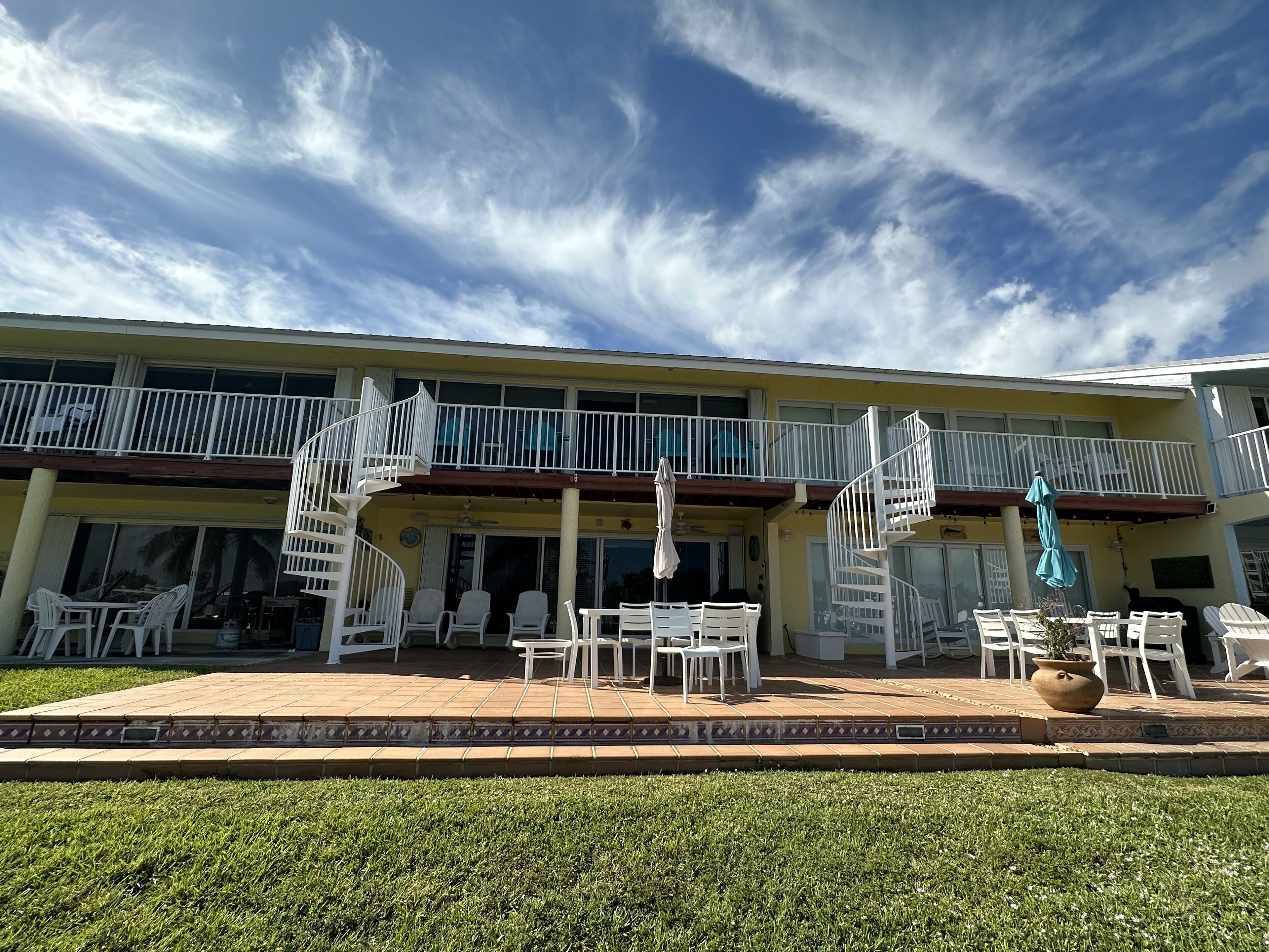 Exterior patio with direct marina frontage.