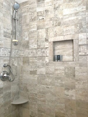 Shower, hair dryer, towels, toilet paper