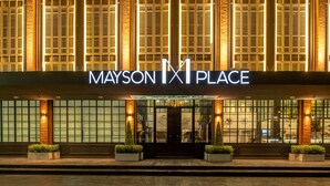A hotel entrance with a sign reading "MAYSON PLACE". - Mayson Place (Samut Prakan)