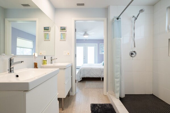 Shower, hair dryer, towels, soap