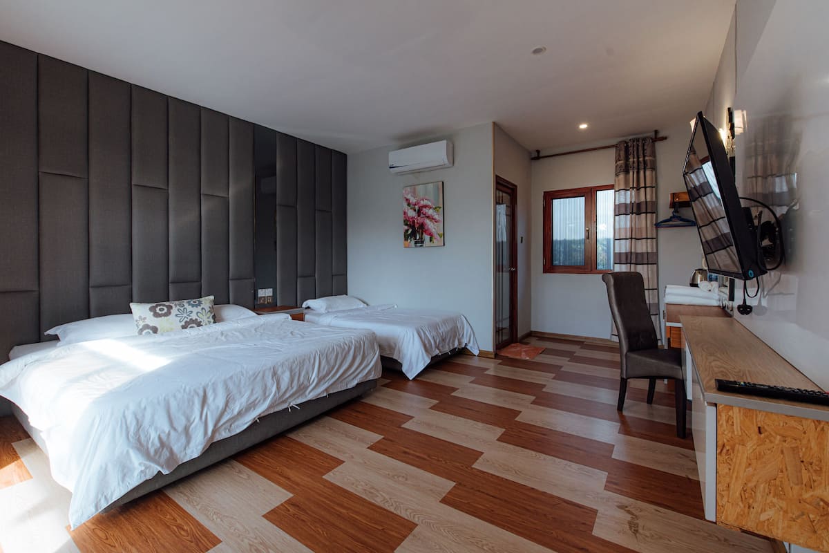 Comfort Triple Room, Pool View, Courtyard Area | Individually decorated, individually furnished, desk, laptop workspace
