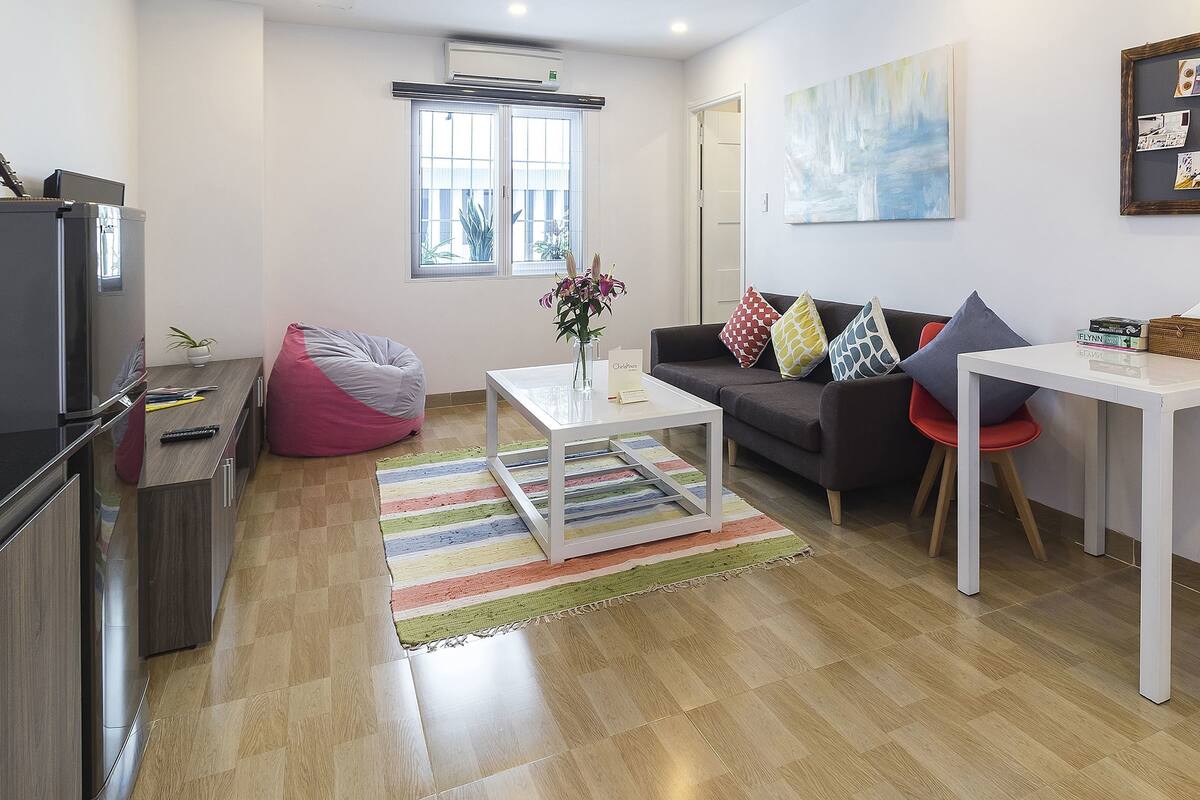 Deluxe Apartment, 1 Queen Bed | Living area | LED TV