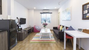 Deluxe Apartment, 1 Queen Bed | Living area | LED TV - Christina's Da Nang (Da Nang)