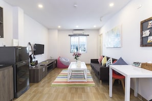 Deluxe Apartment, 1 Queen Bed | Living area | LED TV - Christina's Da Nang (Da Nang)