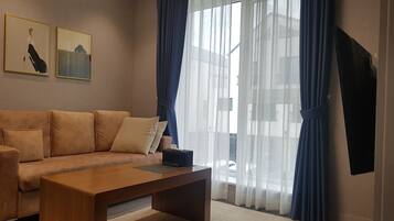 Premium bedding, down duvets, in-room safe, desk