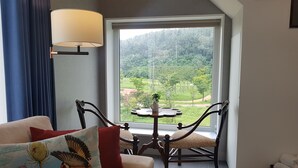 Family Suite, Terrace, Park View | Living area | 40-inch flat-screen TV with digital channels, TV, pay movies