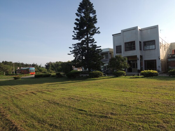 Surrounded by lush greenery, this tranquil retreat offers a serene escape.