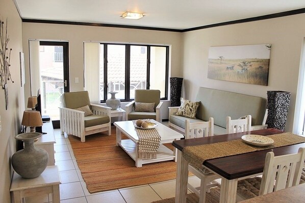 Family Apartment, Non Smoking, Pool Access | Living area | 40-inch Smart TV with satellite channels, TV, Netflix