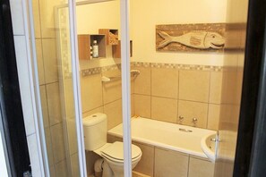 Family Apartment, Non Smoking, Pool Access | Bathroom | Separate bathtub and shower, rainfall showerhead, hair dryer, towels