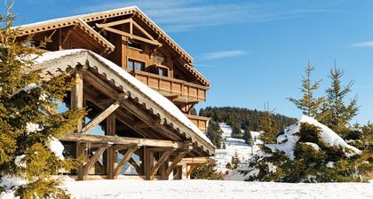 Appartement chaleureux dans un chalet | AccÚs piscine chauffée