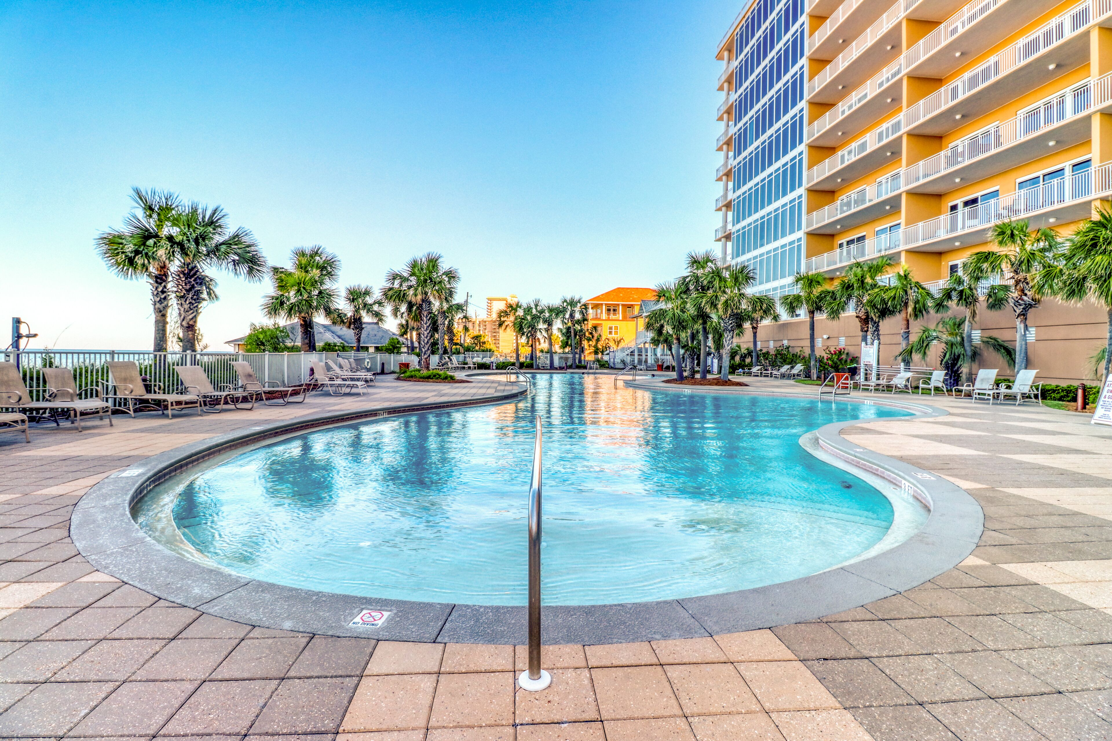 Sprawling, waterfront condo w/ balcony views plus a shared hot tub, pool, & gym