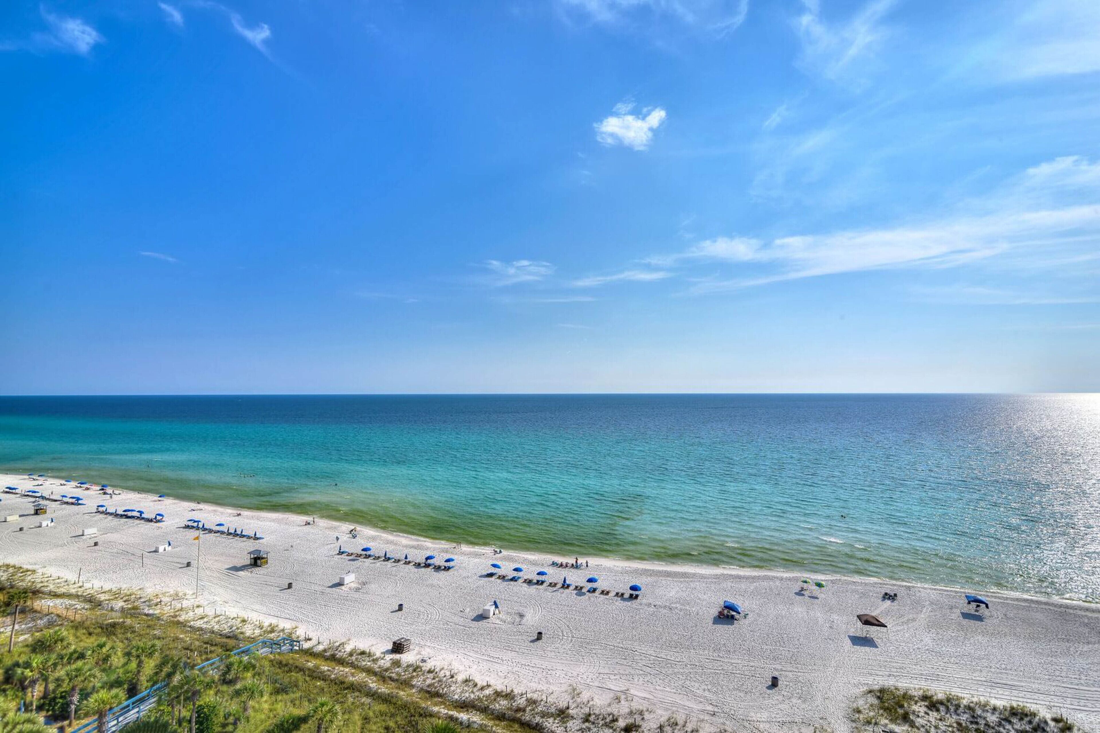 Sprawling, waterfront condo w\/ balcony views plus a shared hot tub, pool, & gym