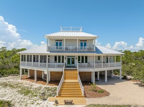 Exterior - LOCATION, LOCATION, LOCATION! This charming house is next door to the Plantation Clubhouse with its large community pool, tennis courts, and fitness center. (St. George Island)