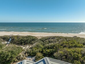 On the beach - Enjoy amazing Gulf views from the covered upper deck at Sea Break. (St. George Island)