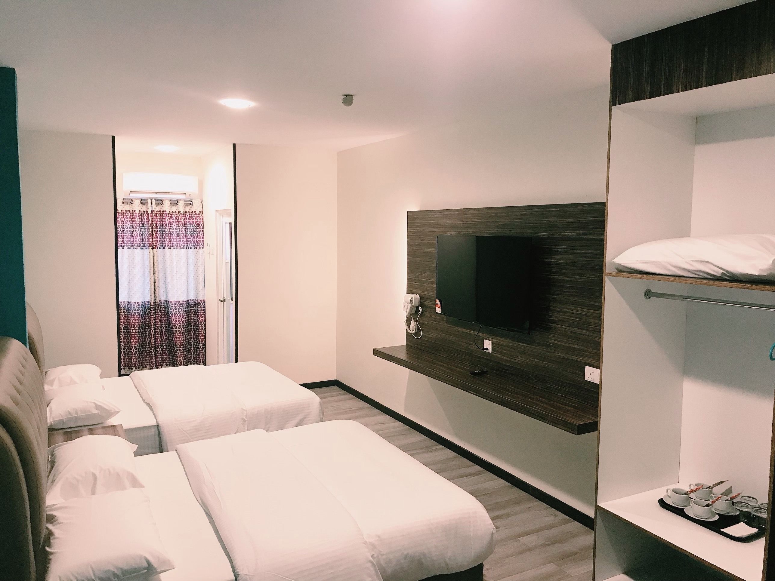 deluxe quadruple room | individually furnished, iron/ironing board, free wifi, bed sheets