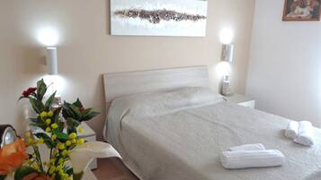 Hypo-allergenic bedding, laptop workspace, iron/ironing board