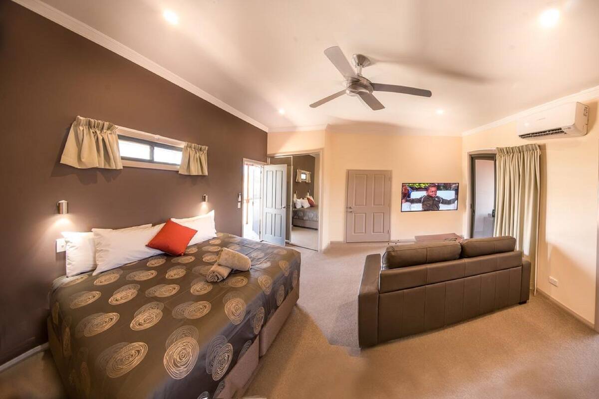 Family Suite | Living area | 50-inch LCD TV with digital channels, TV
