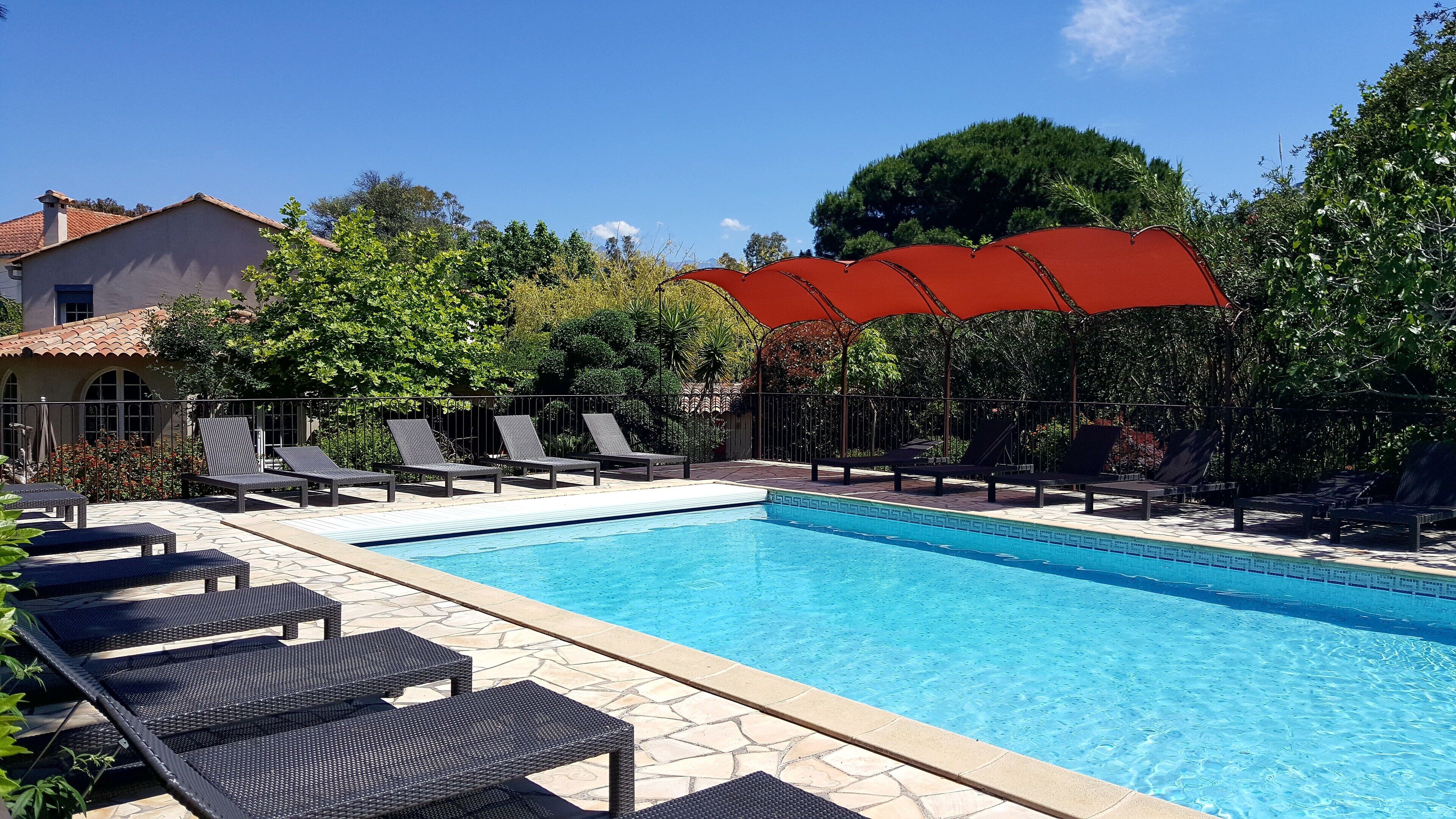Seasonal outdoor pool, pool umbrellas