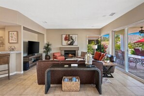 TV, fireplace, books, stereo