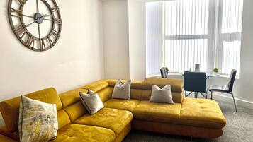 Winter Gardens, 2 Bed Ground Floor Apartment (A1) | Living area | Flat-screen TV