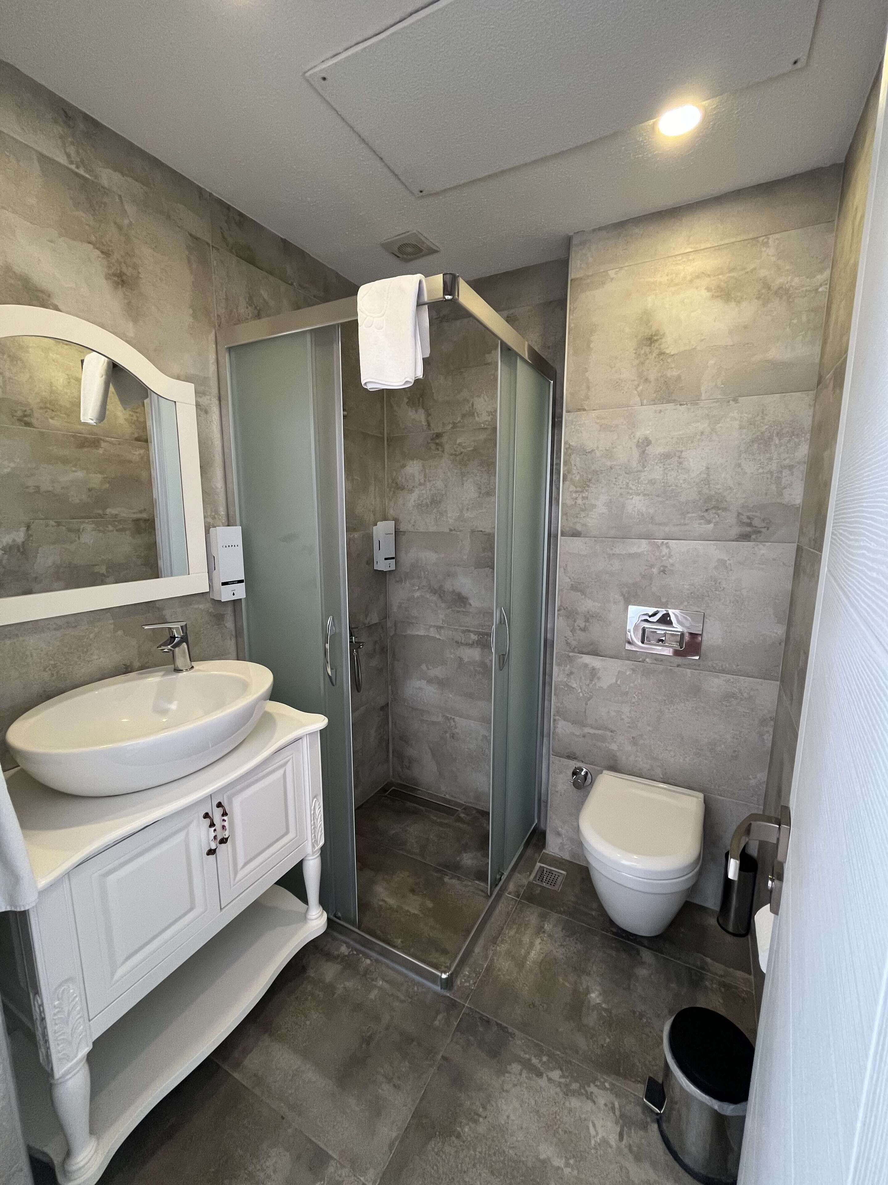 twin room, 2 single beds | bathroom | shower, slippers, towels