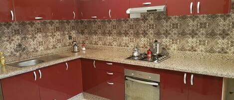 Refrigerador, horno, placa de cocina, cafetera/tetera