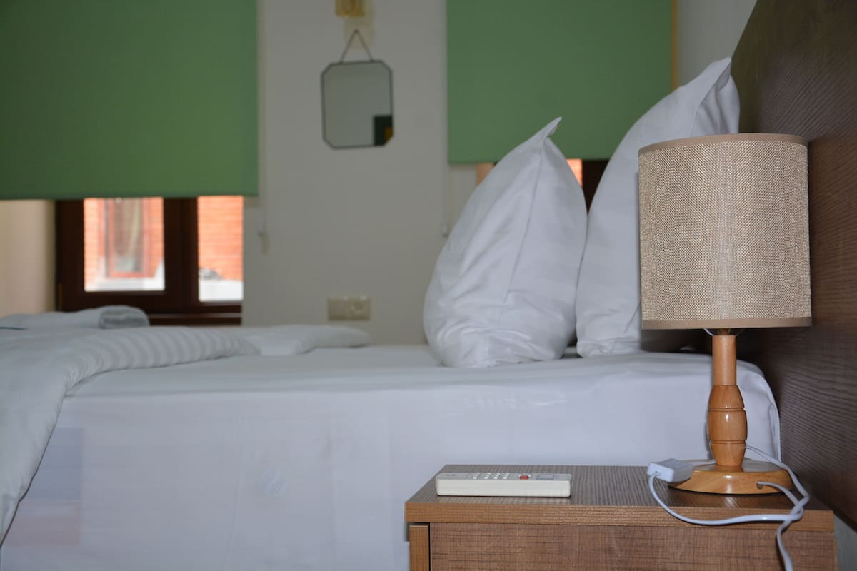 Standard Double Room | Iron/ironing board, free WiFi, bed sheets