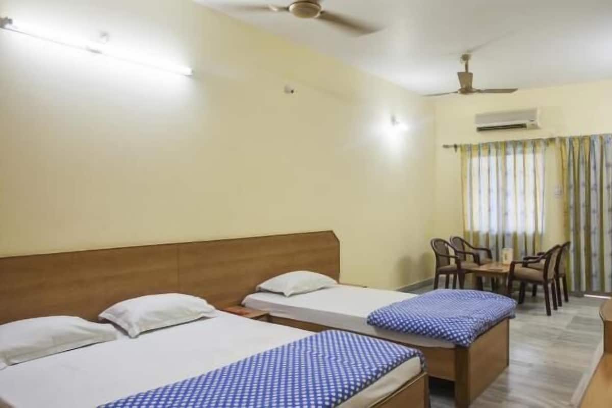 Quarto triplo luxo, várias camas