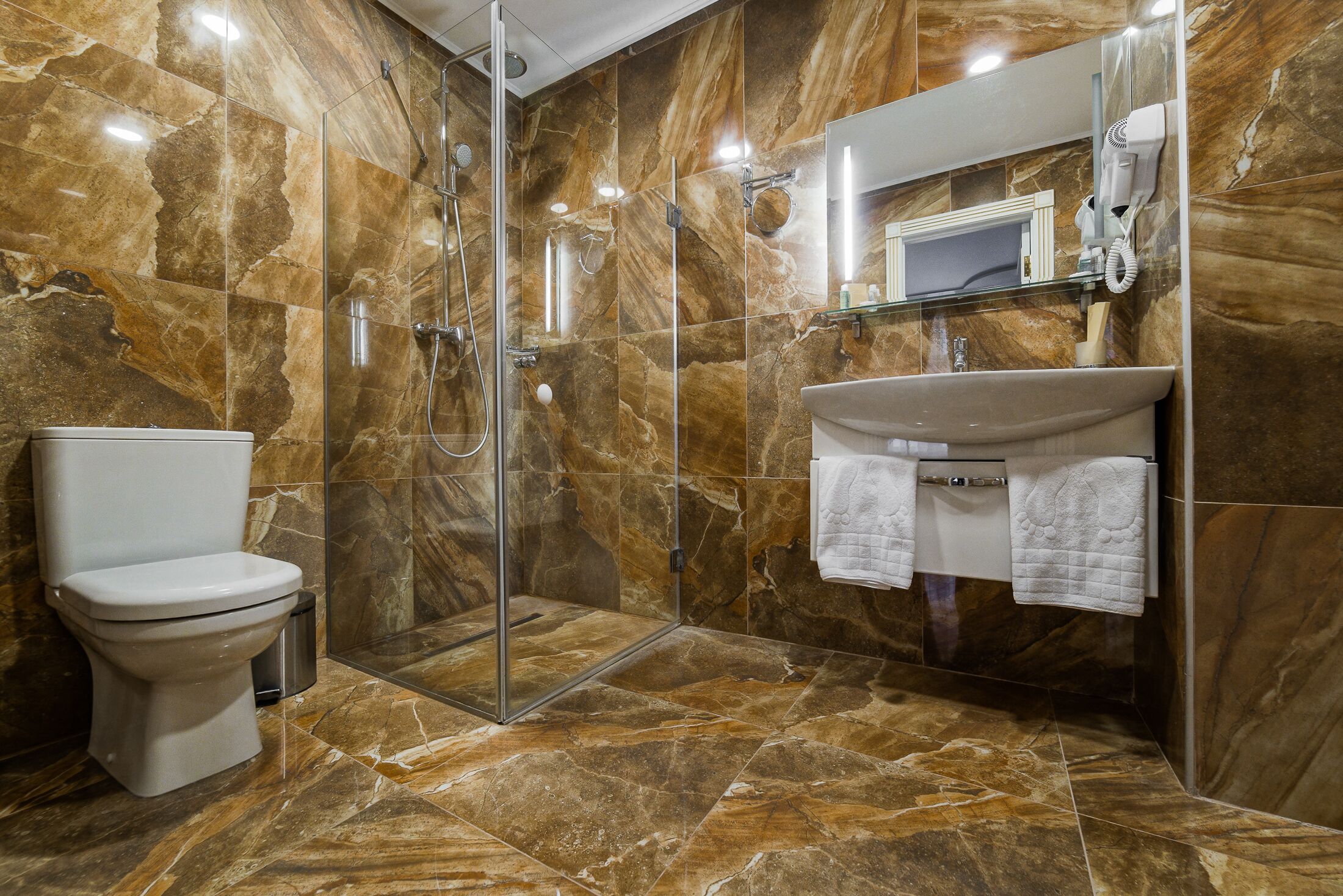 family room | bathroom | shower, free toiletries, hair dryer, bathrobes