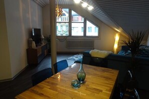 Apartment, 2 Bedrooms | Living area | Flat-screen TV, fireplace, pay films