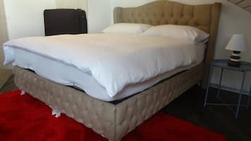 Hypo-allergenic bedding, soundproofing, iron/ironing board, bed sheets