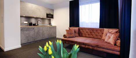 Business Apartment, Multiple Beds, City View | Living area | LCD TV