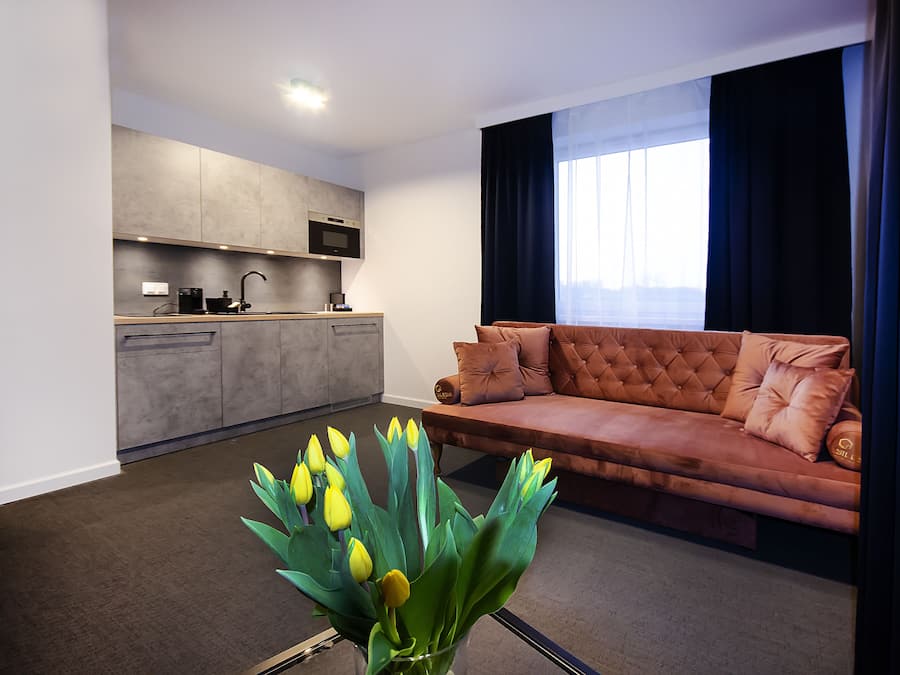 Business Apartment, Multiple Beds, City View | Living area | LCD TV