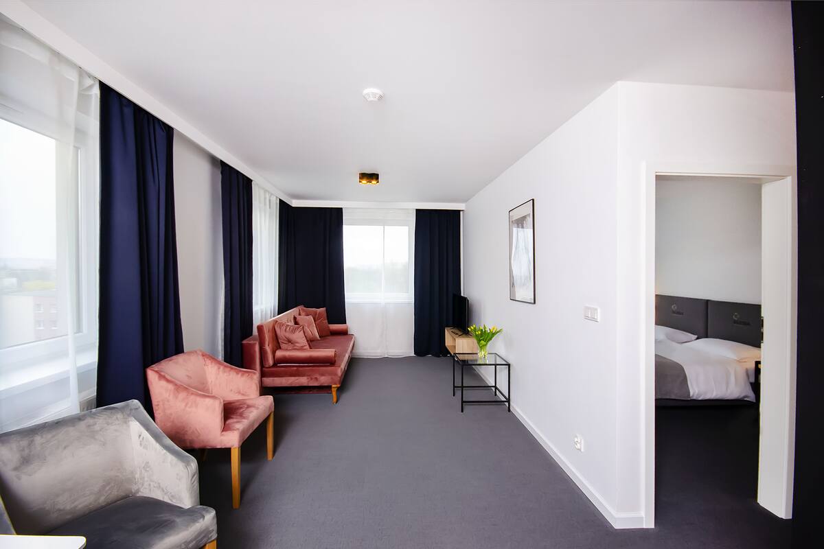 Business Apartment, Multiple Beds, City View | Living area | LCD TV