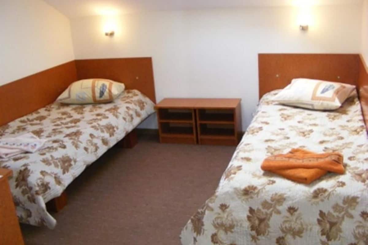 Quadruple Room | Blackout drapes, iron/ironing board (on request), WiFi (free)