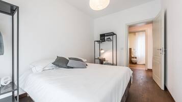 Apartamento, 3 quartos | 3 quartos, roupas de cama premium, edredons de pluma