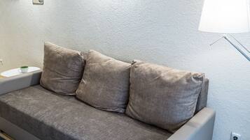 Standard Apartment, 1 Bedroom, City View | Living area | 27-inch flat-screen TV with digital channels, LED TV