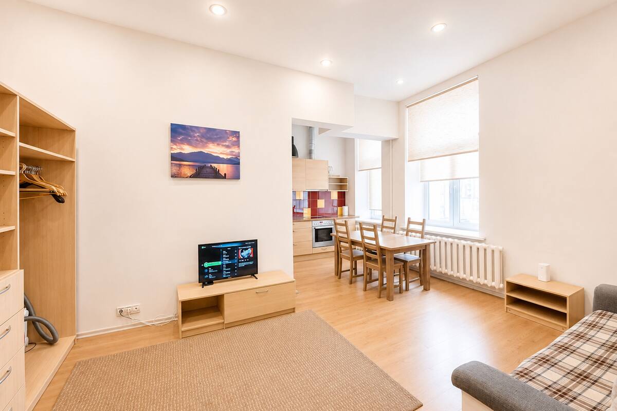 Departamento, 1 habitación, para no fumadores, vista al patio | Área de sala de estar | Televisión de pantalla plana de 27 pulgadas con canales digitales 
