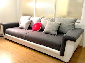 Apartment, 1 Bedroom, Non Smoking, Courtyard View | Living area | 27-inch flat-screen TV with digital channels, LED TV - Elizabetes Center Apartments (Riga)