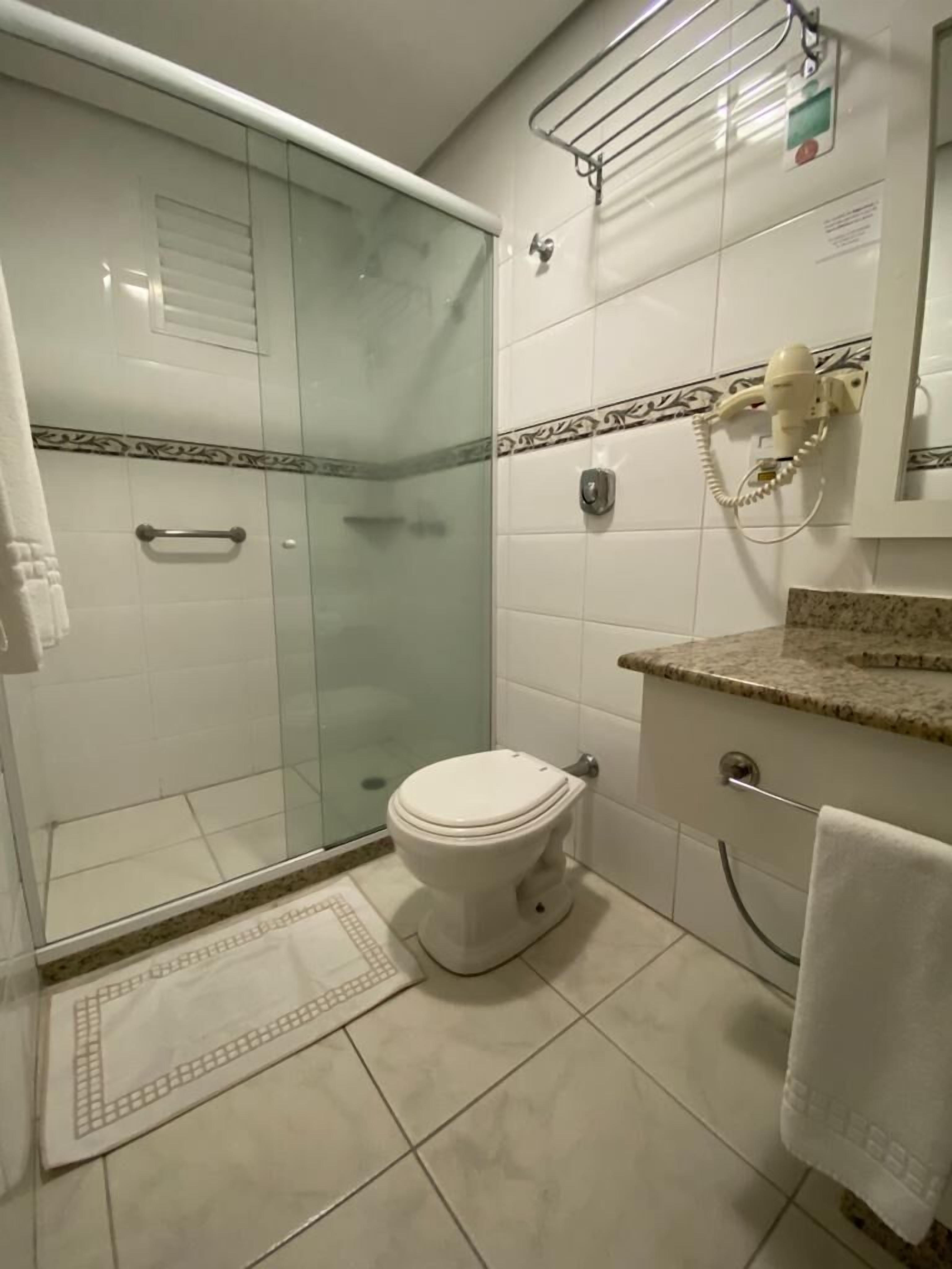 shower, free toiletries, hair dryer, towels