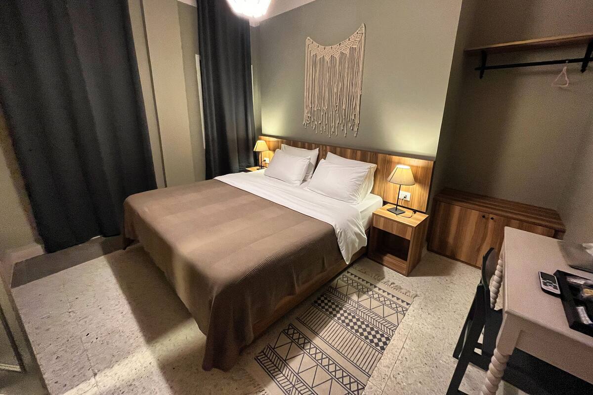 Classic Double Room | Minibar, in-room safe, desk, laptop workspace
