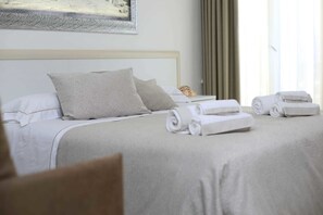 Family Double Room, 1 Queen Bed, Partial Sea View | In-room safe, blackout drapes, soundproofing, cribs/infant beds - Bella Costa (Porto Cesareo)