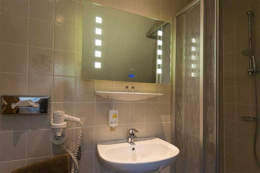 Shower, free toiletries, hair dryer, towels