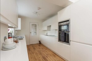 Fridge, microwave, coffee/tea maker, electric kettle