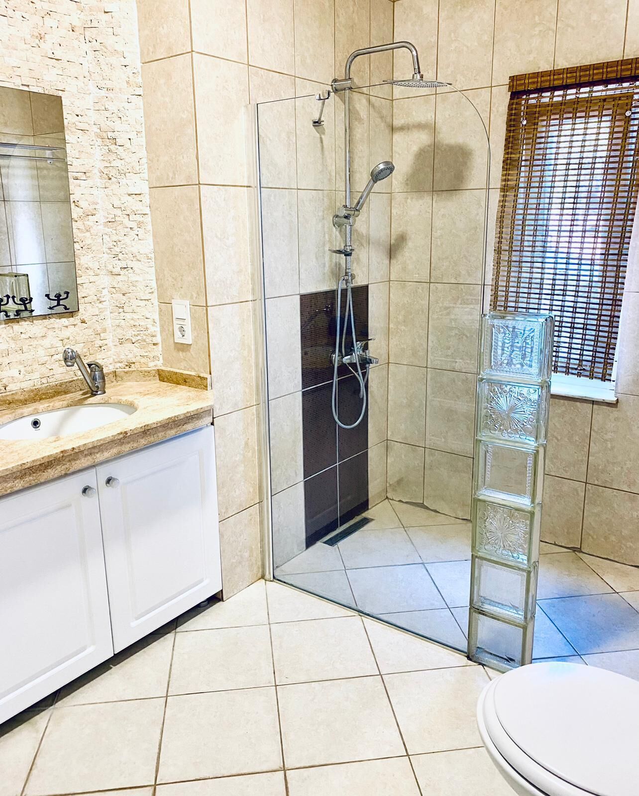 family apartment | bathroom | shower, rainfall showerhead, hair dryer