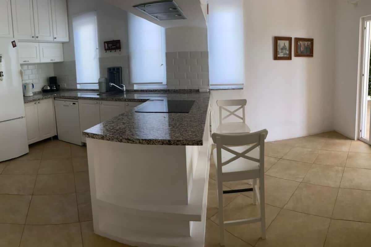 comfort apartment | private kitchen | full-sized fridge, dining tables