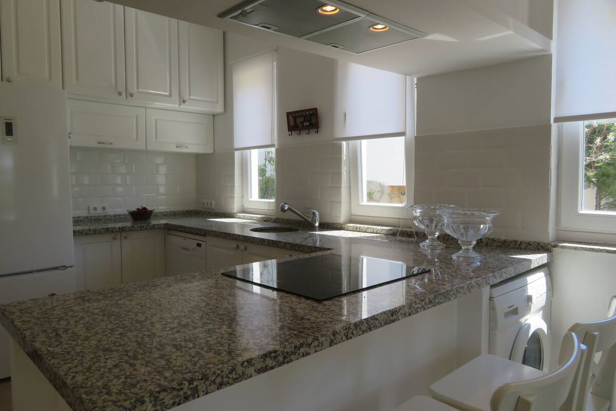 comfort apartment | private kitchenette | full-sized fridge, dining tables